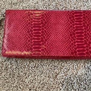 Fuchsia Snake-Embossed Wristlet Clutch